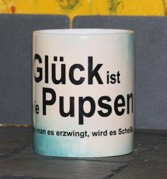 Weiße Tasse mit Spruch "GLÜCK IST WIE PUPSENWENN MAN ES ERZWINGT"