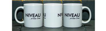 Weiße Tasse mit Spruch "Niveau ist keine Creme"