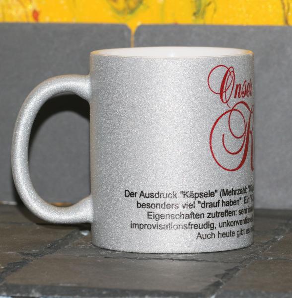 Weiße Tasse mit Spruch "ONSER KÄPSELE