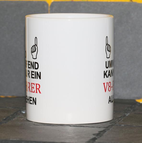 Weiße Tasse mit Spruch"SO UMWERFEND KAN NUR EIN ................ AUSSEHEN"
