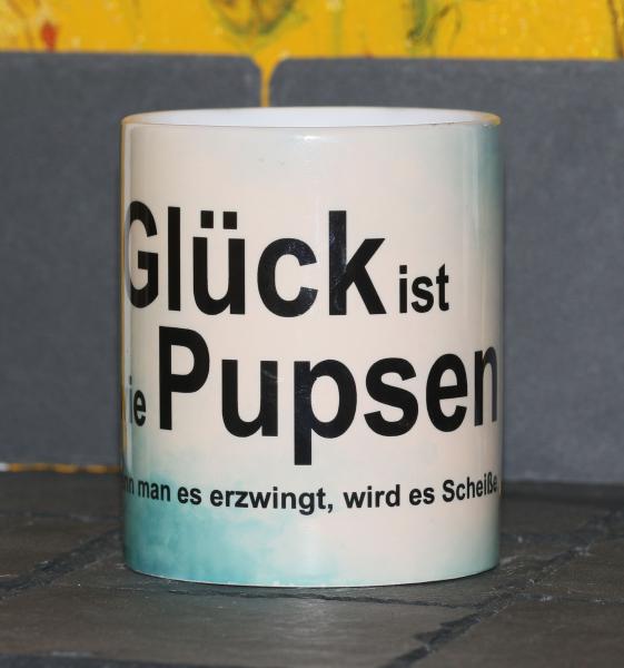 Weiße Tasse mit Spruch "GLÜCK IST WIE PUPSENWENN MAN ES ERZWINGT"