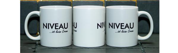 Weiße Tasse mit Spruch "Niveau ist keine Creme"