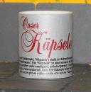 Weiße Tasse mit Spruch "ONSER KÄPSELE"